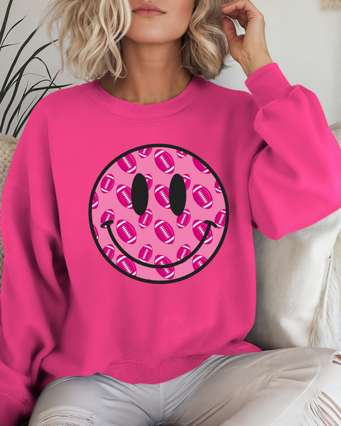 Hot PinkGildan Heavy Blend Crewneck Sweatshirt With Hot Pink Foot Ball Smiley Face